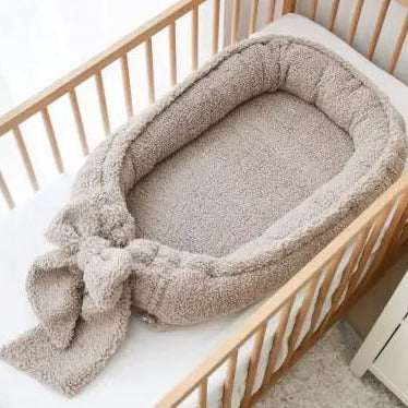 Babynest All Teddy Taupe met strik